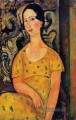 junge Frau in einem gelben Kleid madame Modot 1918 Amedeo Modigliani